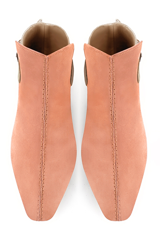 Peach orange, gold and tan beige women's ankle boots with buckles at the back. Square toe. Flat flare heels. Top view - Florence KOOIJMAN